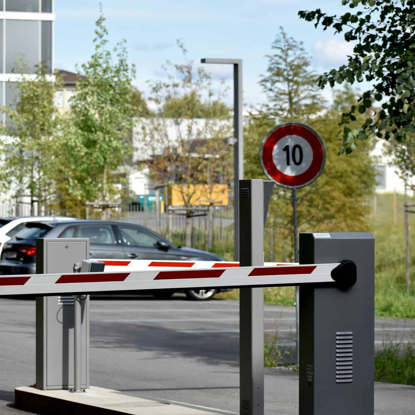 Car parking barrier to control vehicle access to premises.
